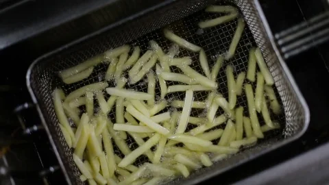 Potatoes cooked in deep fat Stock Footage 70171975
