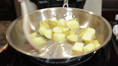 Potatoes cooked in a pan Stock Footage 140362945