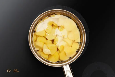 Potatoes is cooked in pan Stock Photos
