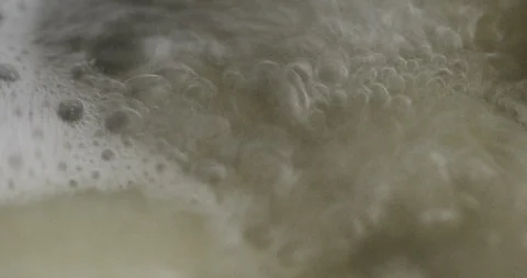 Potatoes cooking in boiling water Stock Footage 97380979