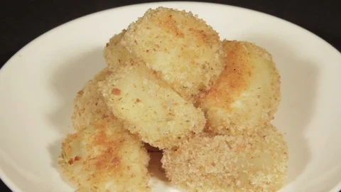 Potatoes with a crispy crust with rosemary Stock Footage 70105129