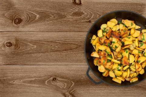 Potatoes On Dark Background Stock Photos