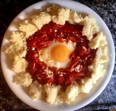 Potatoes with an egg Stock Photos