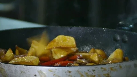 Potatoes Fall Into the Pan Stock Footage 78594191