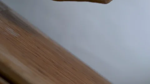 Potatoes falling in slow motion onto a cutting board Stock Footage 100007817