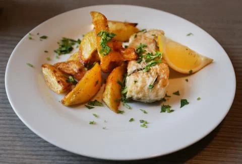 Potatoes with fish Stock Photos