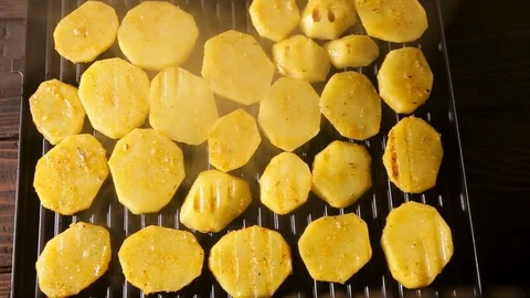 Potatoes fried on the grill top view Stock Footage 100606079