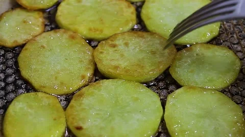 Potatoes fried in a pan Stock Footage 151764819