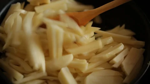 Potatoes frying in a pan Stock Footage 37453478