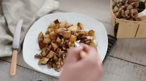 Potatoes with mushrooms Stock Footage 49827794
