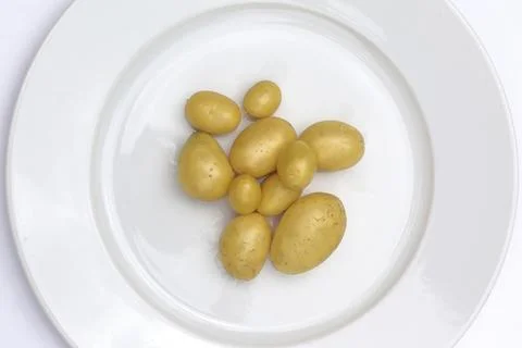 Potatoes on a plate Stock Photos