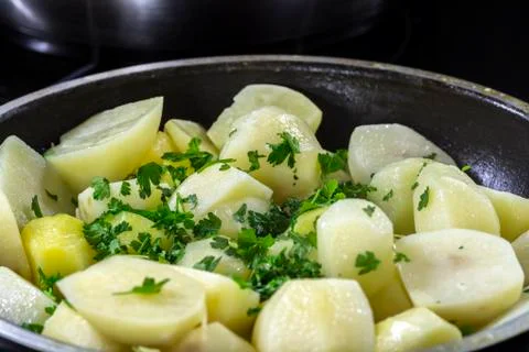 Potatoes in the process of frying Stock Photos