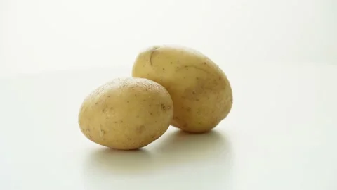 Potatoes Rotating On White Background 스톡 동영상 236622637