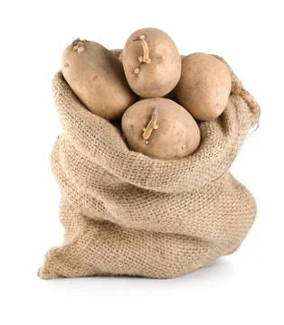 Potatoes in sack Stock Photos
