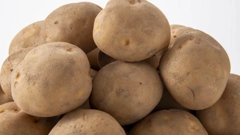 Potatoes Stacked Together, Close-Up Shot 4k Stock Footage 339596489