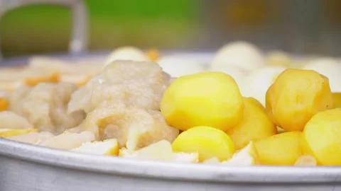 Potatoes, Tofu and Eggs steaming in a steam pot.Street food named Siomay Stock Footage 231121950