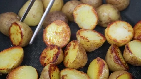 Potatoes-turning-1 Stock Footage 98228729