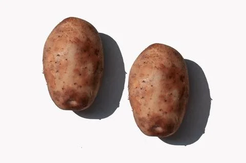 Potatoes on a white background. Isolated Stock Photos