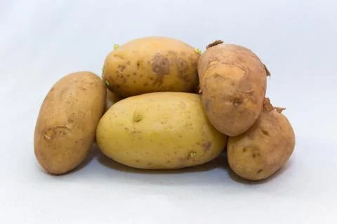 Potatoes, white background Fotos Stock