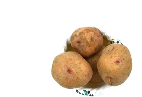 Potatoes on white background Stock Photos