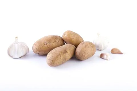 Potatoes on a white background. The vegetable on a white background. Stock Photos