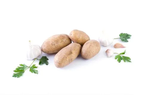 Potatoes on a white background. The vegetable on a white background. Stock Photos