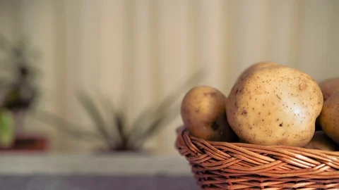 Potatoes in Wicker Basket Stock Footage 71558610