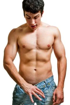 Potency and penis size concept - man looking in his pants Stock Photos