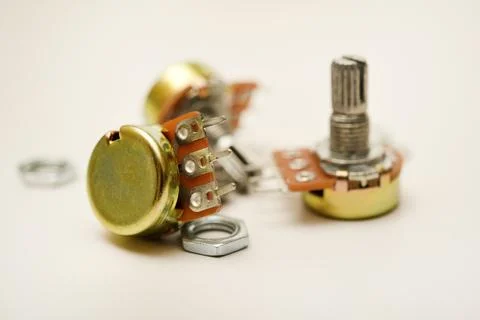 A potentiometer with fasteners. Variable resistor. A resistor with a rotator. Fotos de archivo