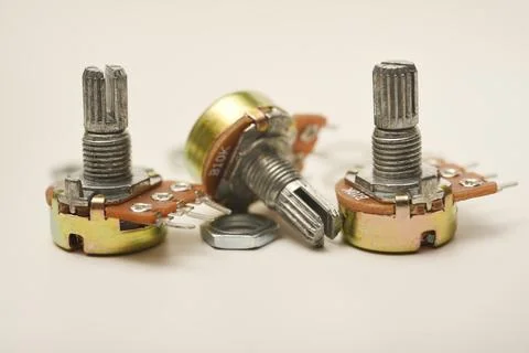 A potentiometer with fasteners. Variable resistor. A resistor with a rotator. 스톡 사진