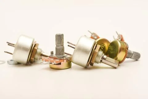 Potentiometers. Variable resistors. Devices for voltage changes. Stock Photos