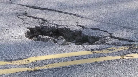 Pothole closeup Stock Footage 51807373