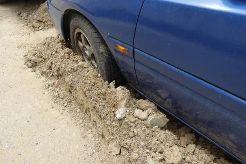Pothole, damage on the road Stock Photos