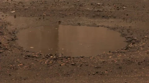 Pothole Large Wet 2 Stock Footage 40340594