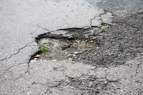 Pothole Stock Photos