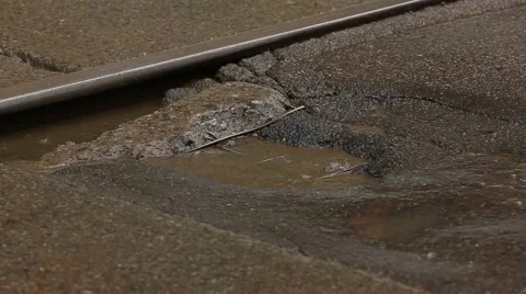 Pothole on the road. close-up 스톡 동영상 54174624