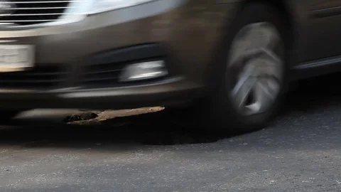 Pothole on the road Video stock 69861438
