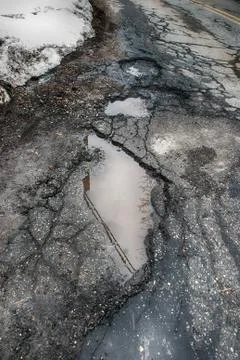 Pothole in road Foto stock