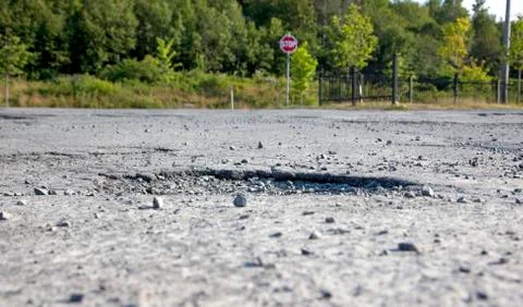 A pothole in the road Stock Photos