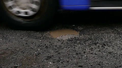 Pothole in the street Stock Footage 60237021