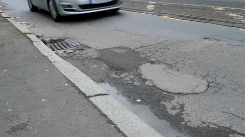 Pothole on the street Видео 125272546
