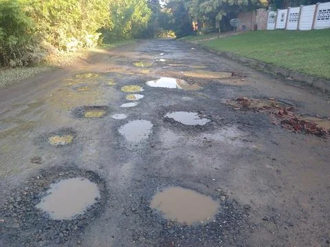 Potholes Stock Photos