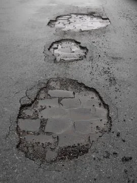 Potholes / road damage Stock Photos