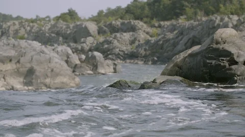 Potomac River splashes over rocks in Great Falls Park Stock Footage 91901966
