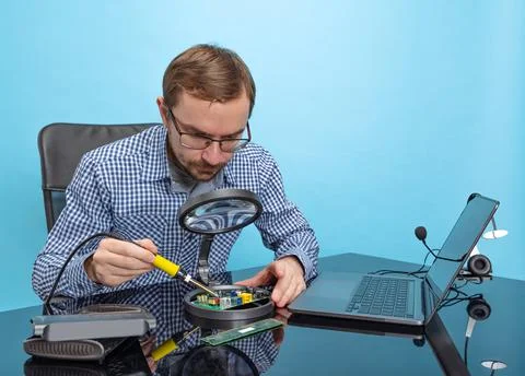 Potrait of professional programmer, technical specialist working with Stock Photos