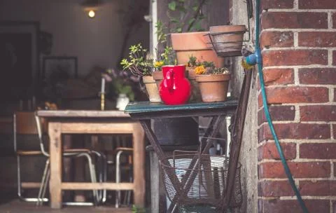 Pots and vases on a table Stock Photos