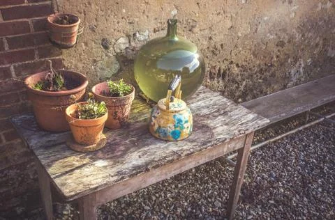 Pots and vases on a table Stock Photos