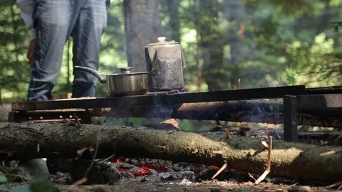 Pots on campfire Stock Footage 73016760