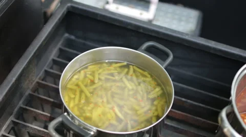 Pots cooking on the grill Stock-Footage 50542972