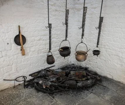 Pots hanging over a fire Stock Photos